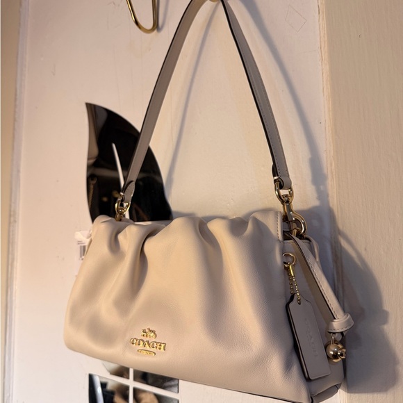 Coach Handbags - Coach Beige Shoulder Bag with Gold Accents